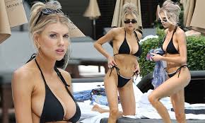 She is an actress, known for остров фантазий. Charlotte Mckinney Leaves Little To The Imagination As She Flaunts Her Figure In A Tiny Black Bikini Daily Mail Online