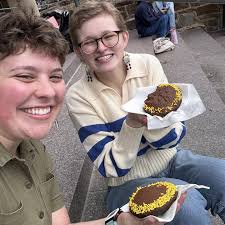 Cheers rang out at Burke Library for the parting of the clouds and boos  filled the darkened skies when clouds blocked the final stages of Monday's  solar eclipse. All in all it