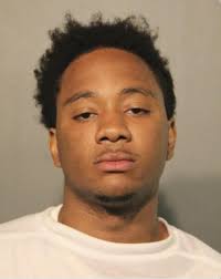 Two men charged in fatal Chicago shopping district shooting