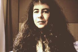 Collier plastron en raphia et lurex