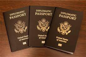 A diplomat has to present both the diplomatic passport and the normal passport at the airport when going for an official trip and both must be signed. Diplomatic Passports Regulations Interpol