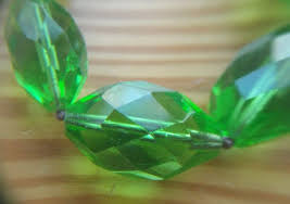 From time to time glass and ceramics have been on the unshippable item list, and i imagine that this is because of their insurance cover, too many claims of damage in transit to be sustainable and insurable. Green Glass Beads Light Up Under Blacklight Are These Uranium Glass Antiques Board