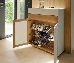 Two doors conceal four fixed shelves with storage space for up to 15 pairs of shoes. Luxury Entrance Hallways Wharfside European Furniture Entryway Shoe Storage Closet Shoe Storage Shoe Storage Unit