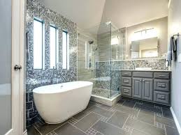 We were able to create a bathroom space which include warm colors (wood shelves, wall color, floor tile) and crisp clean finishes (vanity, quartz, textural wall tile). Modern Master Bathroom Designs 2019