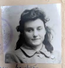 Can anyone enhance and edit this old photo of my Serbian great-grandmother?