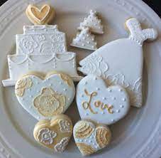 Decorated White And Gold Wedding Dress And Cake Cookies With Hearts And Minis Perfect For Bridal Shower Bridal Shower Cookies Cake Bridal Wedding Dress Cookies