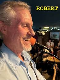 Saw two new bands: Rick O'Shay and the Bullets, and Drayman and the  Cartridges. Both very loud; explosive sound, you might say.