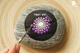 Hand painted rock, painted using acrylic paints and lightly coated with mod podge for protection. Mandala Stones Diy Colorful Crafts