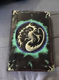 Mal S Spell Book Is A Book Of Spells That Appears In The Disney Channel Movies Descendants And Disney Descendants Mal Mals Spell Book Disney Descendants Dolls