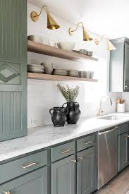 Well, there are quite a few materials out there that can make for marie hebson combines the swamp green countertop with the blue mosaic backsplash and white cabinets. Green Marble Countertops Design Ideas