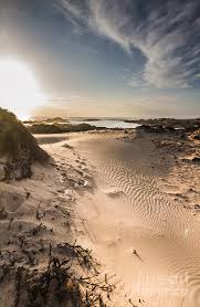 The most obvious way to use a tapestry is as an accent on a focal wall, perhaps as a wall hanging behind a bed to replace a headboard, but there are other ways that a fun and unique as well!. Sandy Beach Haven Photograph By Jorgo Photography
