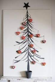 40 Diy Alternative Christmas Trees Adding Fun Wall Decorations To Green Holiday Decor Diy Christmas Wall Recycled Christmas Tree Wall Christmas Tree