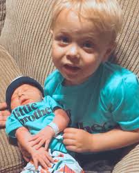 Dylan and Matthew meet for the first time 💙💙 #brothers #dobsonpartyof4  #boymom #newfishingbuddy #decemberbaby