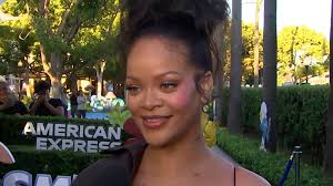 Rihanna was so happy to bring her children to the #Smurfs premiere!