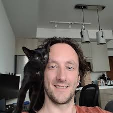 This foster kitten has one goal in life: to smush her face into my face