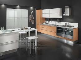 Dark cabinets don't have to be black—if the midnight mood isn't for you, consider a lighter shade of brown. Kitchen With Black Floor Tiles Novocom Top
