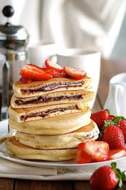 An Ingenious Trick For Making Perfect Nutella Stuffed Pancakes Nutella Recipes Recipetin Eats Nutella Pancakes