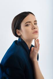 Beautiful Earnest Young Lady Wearing a Jacket Stock Photo