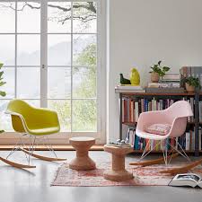 These molded fiberglass side chairs are fun for any room. Vitra Eames Plastic Armchair Rar Connox