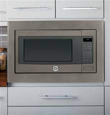 Designed to add distinction and durability to your home's kitchen and living spaces, black slate is versatile enough to match nearly any décor, yet striking enough to command just the right amount of attention. Ge Profile Series 2 2 Cu Ft Countertop Microwave Oven Peb7226ehes Countertop Microwave Oven Countertop Microwave Kitchen Construction