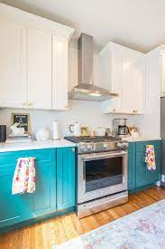These diy painted kitchen cabinets changed the entire look of my kitchen with a little elbow grease and minimal financial investment. Converting A Two Family Into A One Family House In New Jersey Turquoise Kitchen Cabinets Kitchen Design Kitchen Cabinets