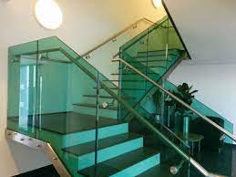 Staircase With Frameless Glass Balustrade Green Tint And Oak Treads With Walnut Stain Stairs Stair Treads Glass Balustrade