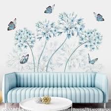 Decorations with flowers, leaves and trees together with other floral designs have always been very popular. Stickers Center Decorative And Artistic Wall Sticker Butterflies And Blue Flowers