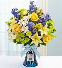 And embarrassed at even getting my mom these. It S A Boy Send This Cute Flower Arrangement To A New Mom Or Use For Baby Shower New Baby Flowers Flower Delivery 800 Flowers