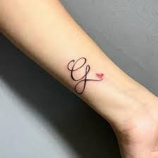 For girls the best area to get an initial tattoo is on their wrist. Top 20 G Letter Tattoo Designs Suitable For Men And Women