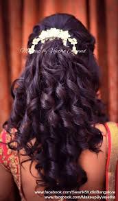 Play up your hair's natural texture for an effortless 'do. Curly Reception Indian Bridal Hairstyle Novocom Top