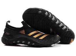 Black Adidas Shoes With Gold Adidas Outdoor Equipped With High End Technologies In 2020 With Images Nike Shoes Women Black Running Shoes Adidas Shoes Originals