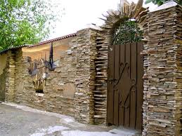 Exterior wall brick wall fence designs. Beautiful Fence Designs Blending Various Materials For Unique Modern Walls