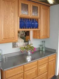 Maybe Pale Cool Gray Blue Green Feels Fresh With The Oak Cabinets Kitchen Design Trends Kitchen Design Small Kitchen Tiles Design
