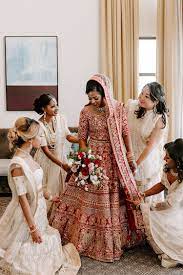 2 Day Love Celebration In Red Gold Multicultural Indian Canadian Wedding Indian Bridesmaids Indian Bridal Outfits Wedding Dress Trends