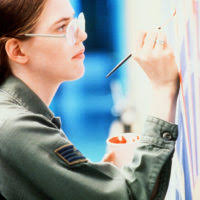 TSGT Ron Swider performs his job as a loadmaster while