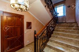 Iron balusters are a great way to include fancy designs without overwhelming the space. A Rich And Beautiful Staircase With Wrought Iron Railings And Stock Photo Picture And Royalty Free Image Image 138171764