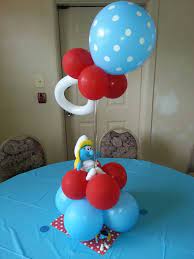 Only after venue is properly decorated can the baby shower get underway. Smurf Theme Centerpieces Smurfs Party Decorations Smurfs Party Baby Shower Favors