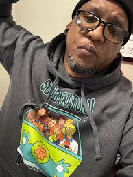 Got this sweatshirt at Cracker Barrel. The back has the back of the van and  Scooby peeking out. One of my favorites