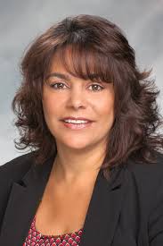 How to price and structure a partial sale of a short-term rental property  to a family member?