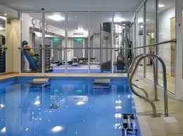 With environmentally friendly saline filtration based water treatment and warmed to a temperature of 86 degrees, the pool is perfect for swimming or learning to swim. Dual Propulsion Endless Pool Swim Side By Side Dream Home Gym Indoor Pool Design Indoor Swimming Pool Design