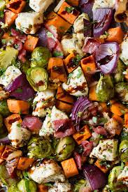 Our flavorful roasted chicken thigh dinner includes brussels sprouts, pears, and some bacon. Sheet Pan Chicken Sweet Potatoes And Brussels Sprouts With Bacon And Balsamic Glaze Cooking Classy