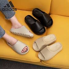 Though west states the slides will soon be available in a range of colorways, the pair pictured above sees a brown colorway with a large velcro strap and a thick, cushioned sole. Yeezy Slides Kanye West Summer Slippers For Women Mens Shopee Philippines