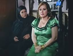 معمر القذافي ، رئيس الدولة الليبي ، يلقي خطابه الأول كرئيس للاتحاد الأفريقي في القاعة العامة لمبنى الأمم المتحدة في أديس أبابا، إثيوبيا، خلال قمة الاتحاد الأفريقي الثانية عشرة في 2 فبراير 2009. Ø¨ÙŠÙ† Ø§Ù„Ù…Ø³Ù„Ø³Ù„Ø§Øª ÙˆØ§Ù„Ø£ÙÙ„Ø§Ù… Ø£Ø¯ÙˆØ§Ø± Ø«Ø§Ù†ÙˆÙŠØ© ØµÙ†Ø¹Øª Ù†Ø¬ÙˆÙ…ÙŠØ© Ø®Ø§ØµØ© Ù„ÙØªØ­ÙŠØ© Ø·Ù†Ø·Ø§ÙˆÙŠ Ø¨ÙˆØ§Ø¨Ø© Ø§Ù„Ø´Ø±ÙˆÙ‚ Ù†Ø³Ø®Ø© Ø§Ù„Ù…ÙˆØ¨Ø§ÙŠÙ„