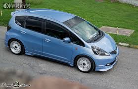 Used 2010 honda fit with tire pressure warning, rear bench seats, aux audio inputs, fold flat rear seats, trip computer. 2010 Honda Fit Wheel Offset Poke Coilovers 340586 Custom Offsets