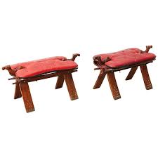 Wood & leather camel saddle foot stool seat, a beautiful handcrafted old foot stool. Moroccan Camel Saddle Stools With Tufted Leather Cushions At 1stdibs
