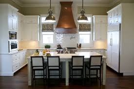 A copper range hood is not just a kitchen accent piece, rather it an important kitchen appliance that draws up all the smoke, grease, odor, and fumes while you are copper range hoods, sometimes called a stove hood, are especially beautiful and suited to even the most hardworking kitchen. Copper Range Hood Cottage Kitchen Urban Grace Interiors
