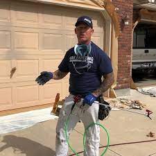 Tips painting a garage DOOR... #paintlife #idahopainter | By The Idaho  Painter | I'm going to be spraying this door right here. This is a metal  garage door using a gun extension