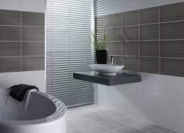 This is testified by our expertise in everything encompassing the domain of floor tiles design, bathroom tiles design, wall tiles design, kitchen tiles design, marble tiles, wooden floor tiles design, and bathroom fittings. Gray Bathroom Wall Tiles Update Business Review Business Small Bathroom Tiles Bathroom Wall Tile Design Bathroom Wall Tile