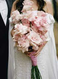 Classics like roses, peonies, lilies, callas, ranunculus, baby's one flower wedding bouquets with greenery. 20 Pretty Pink Wedding Bouquets For Every Style Bride