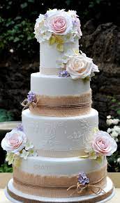 Barn Style Wedding Cake Form Www Tortebella Co Uk With Hessian Ribbon Sugar Flowers And Piped L Wedding Cake Decorations Wedding Cake Tops Lace Wedding Cake